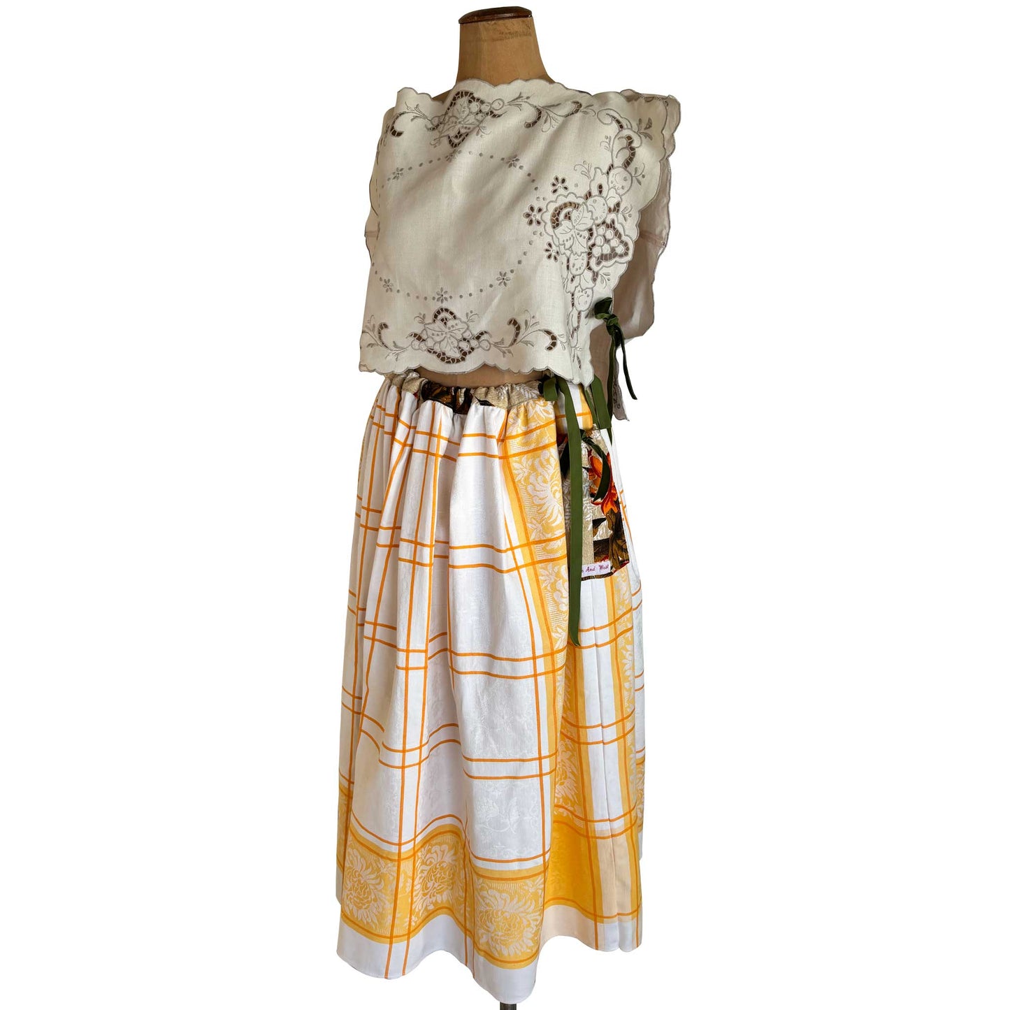 Orange and white woven damask maxi skirt on vintage mannequin, with linen doily hand made top for Love And West