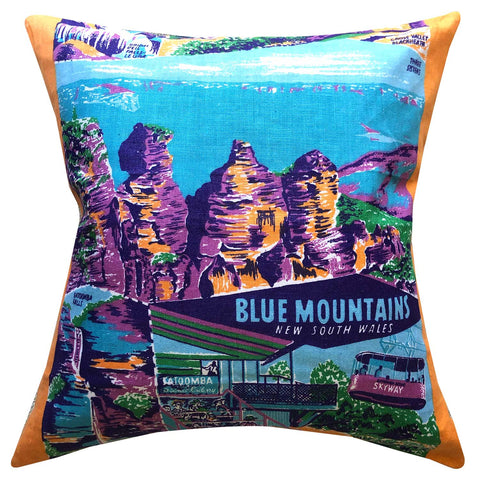 Vintage blue mountains souvenir teatowel cushion cover on white background photographed for LOve And WEst
