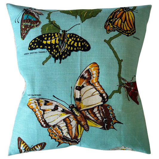 Blue butterflies of Australian vintage linen cushion cover on white background