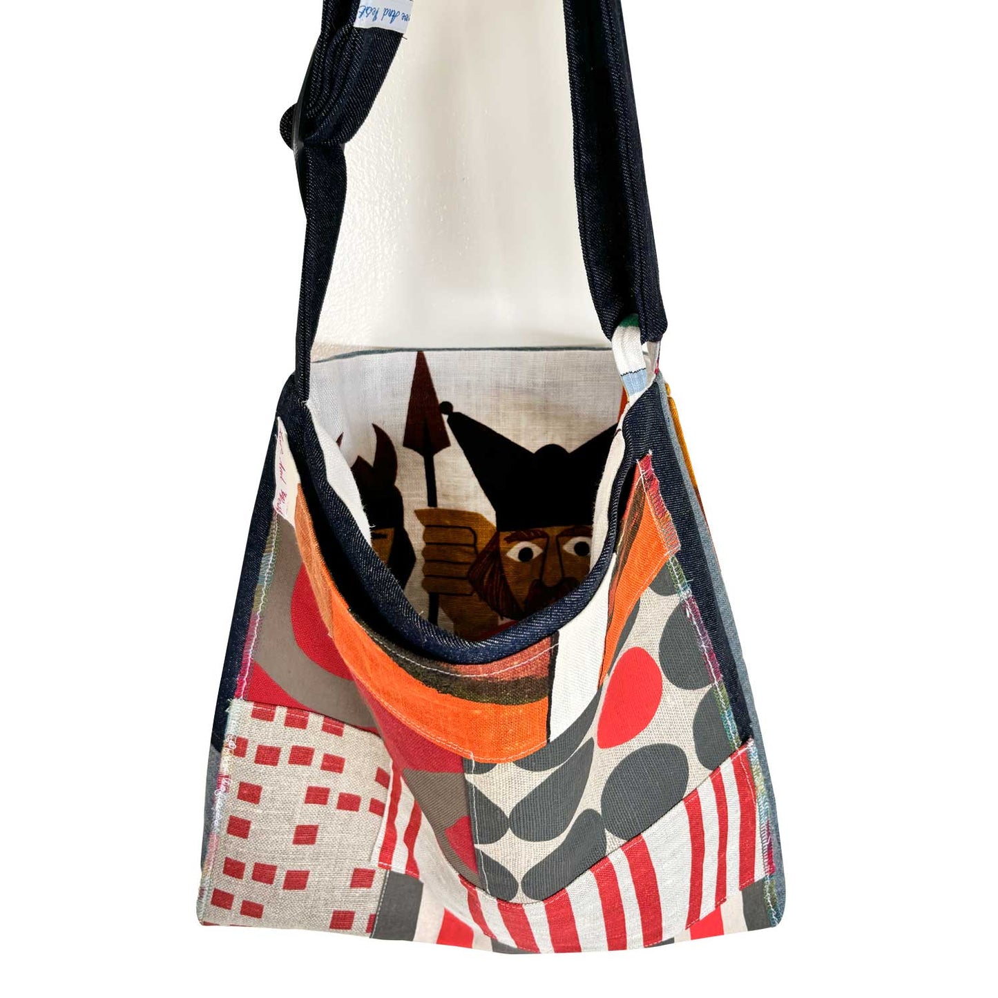 Cloth fabric messenger/cross body bag with visible fabric lining on white background for Love And West