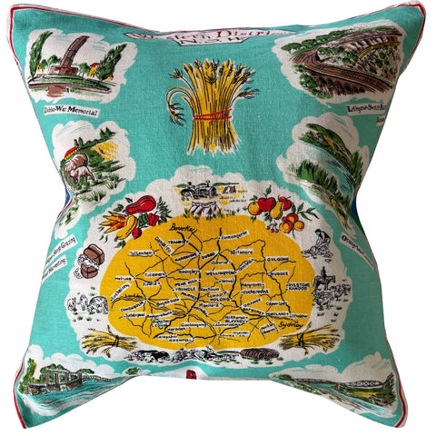 Vintage north west NSW vintage souivenir teatowel pillow on a white background