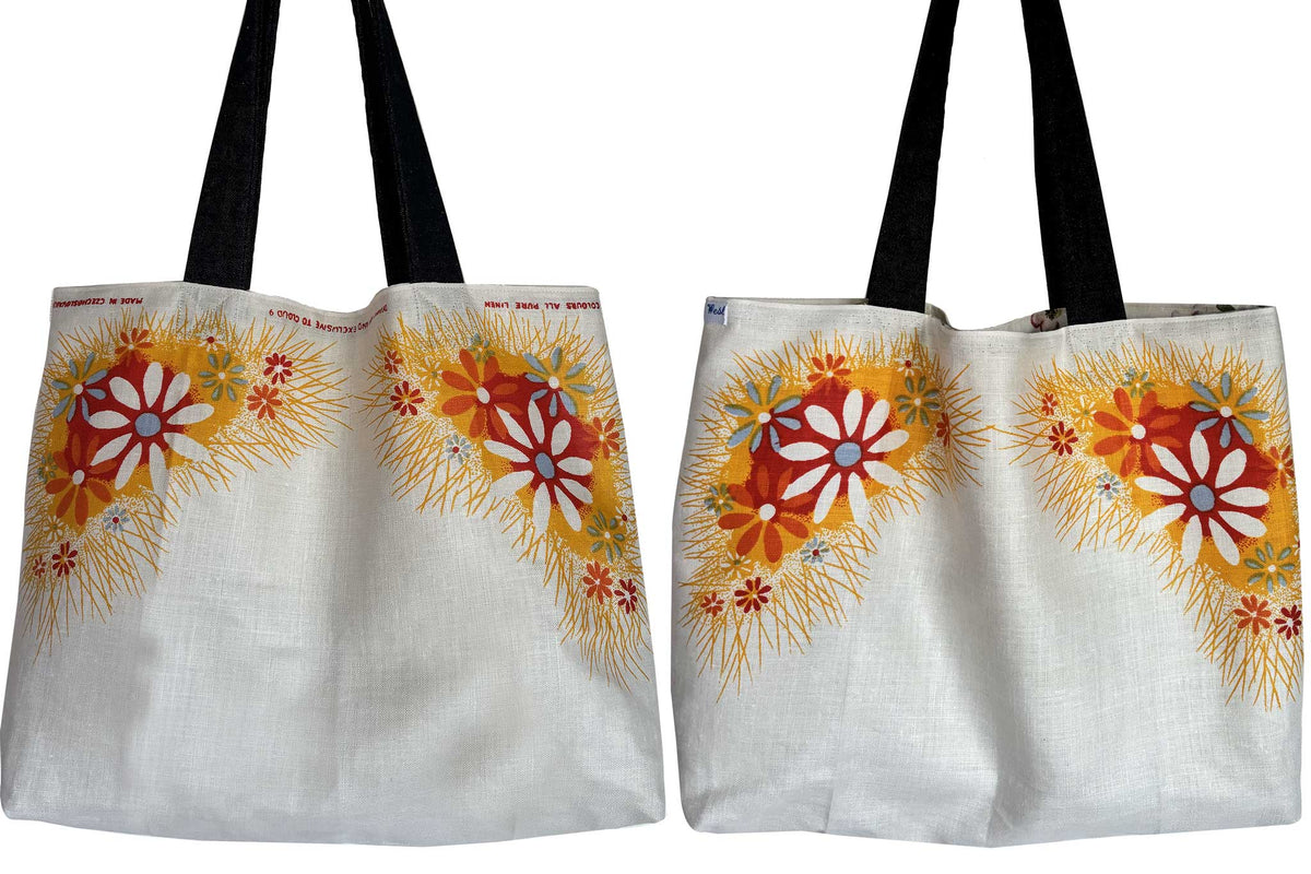 Orange floral vintage linen teatowel tote on white background