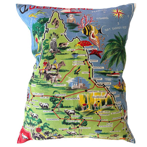 Decorative Queensland souvenir teatowel pillow with map design on a white background