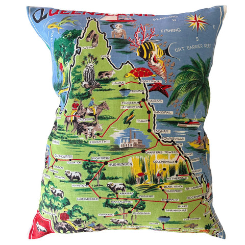 Decorative Queensland souvenir teatowel pillow with map design on a white background