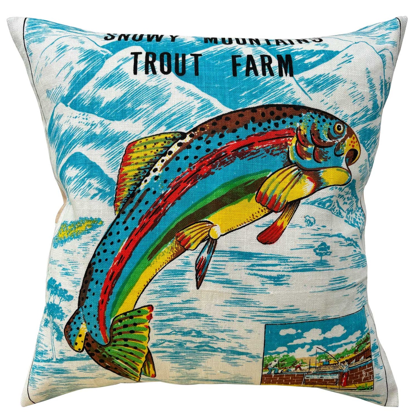 Decorative 'Snowy Mountains Trout Farm' teatowel cushion cover on a white background.
