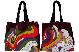 Seventies swirling graphics tea towel tote on white background