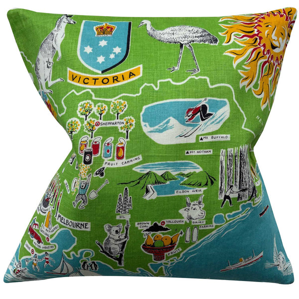 Decorative pillow with a map of Victoria, Australia, featuring various icons and symbols on a green background.