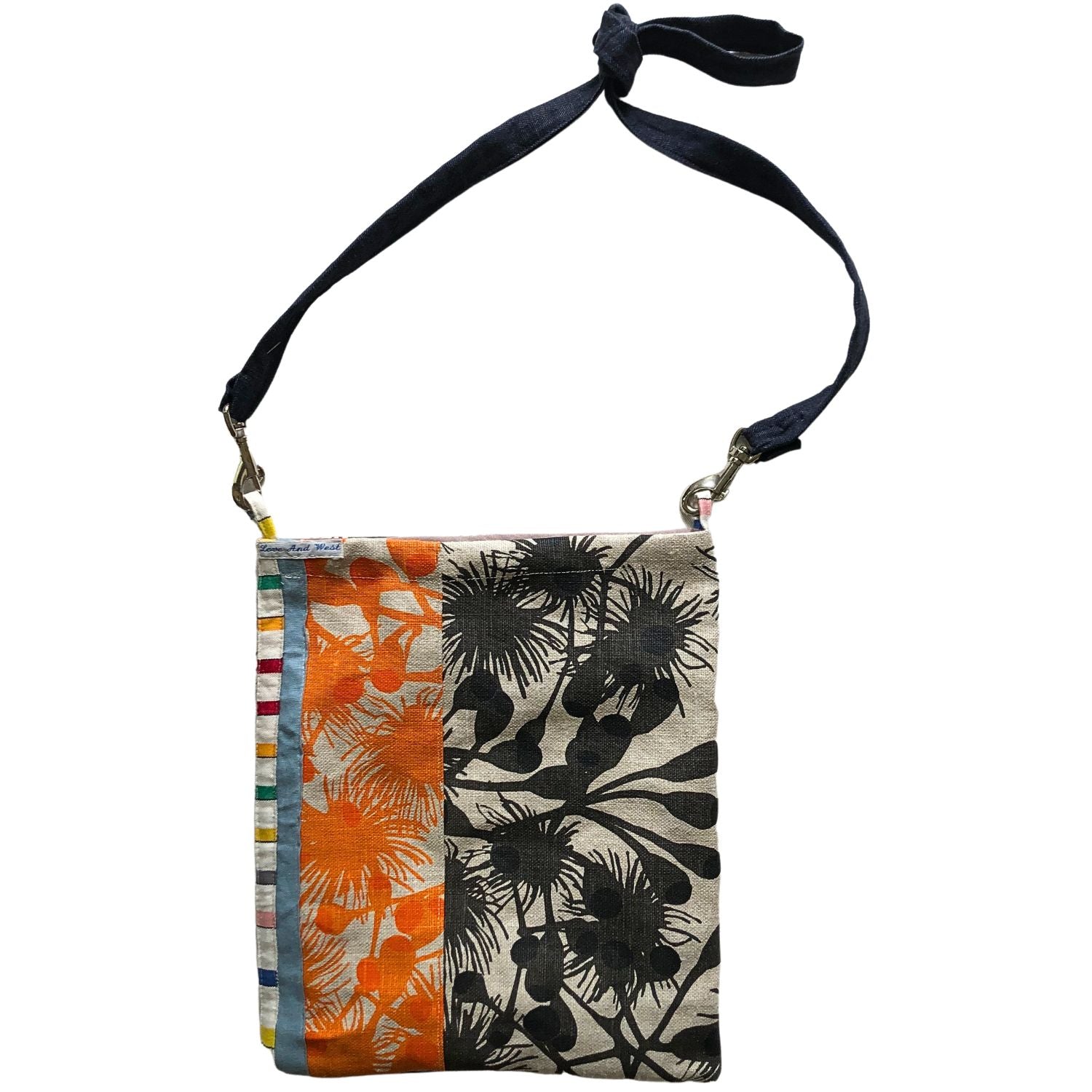 charcoal gumblossom cloth fabric satchel with orange gumblossom reverseLove And West