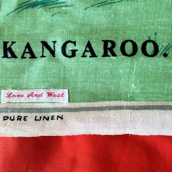 Kangaroos bound across vintage linen teatowel pillow cover