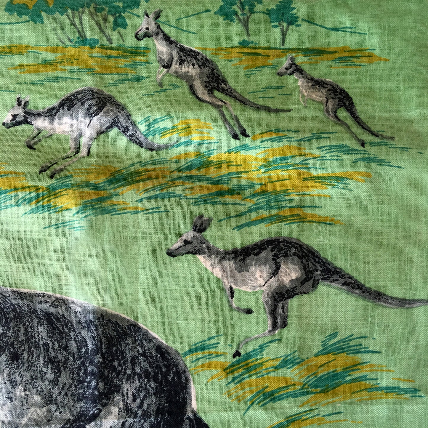 Kangaroos bound across vintage linen teatowel pillow cover