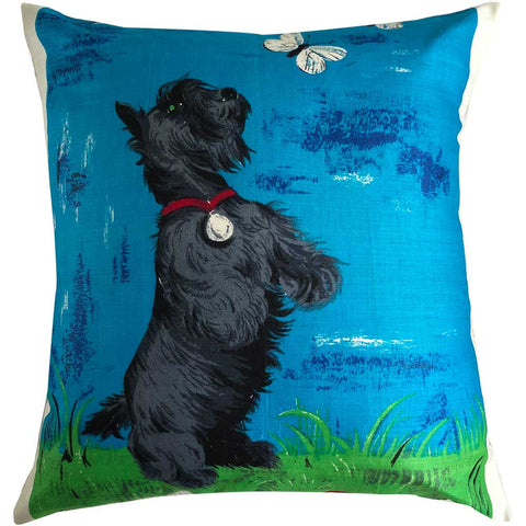 Scotty dog chasing butterflies in a vintage linen teatowel cushion cover